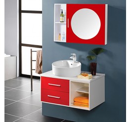 Bright red bathroom vanity with a middle round mirror